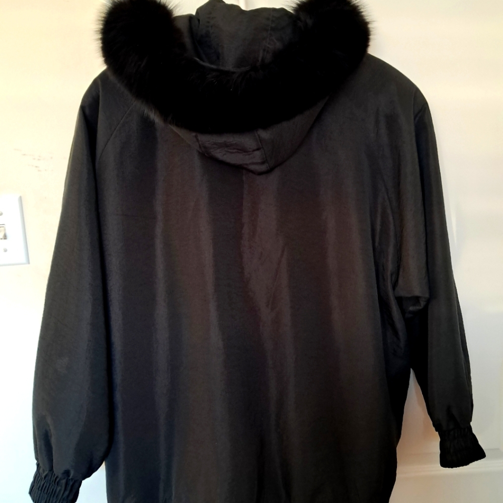 Black hooded jacket with real fox fur trim